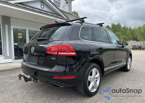 2013 Volkswagen Touareg V6 Tdi z USA, uszkodzony, nr VIN WVGEP9BP8DD005795